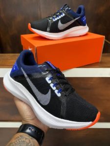 Tênis Nike Quest de cor Preto Branco.